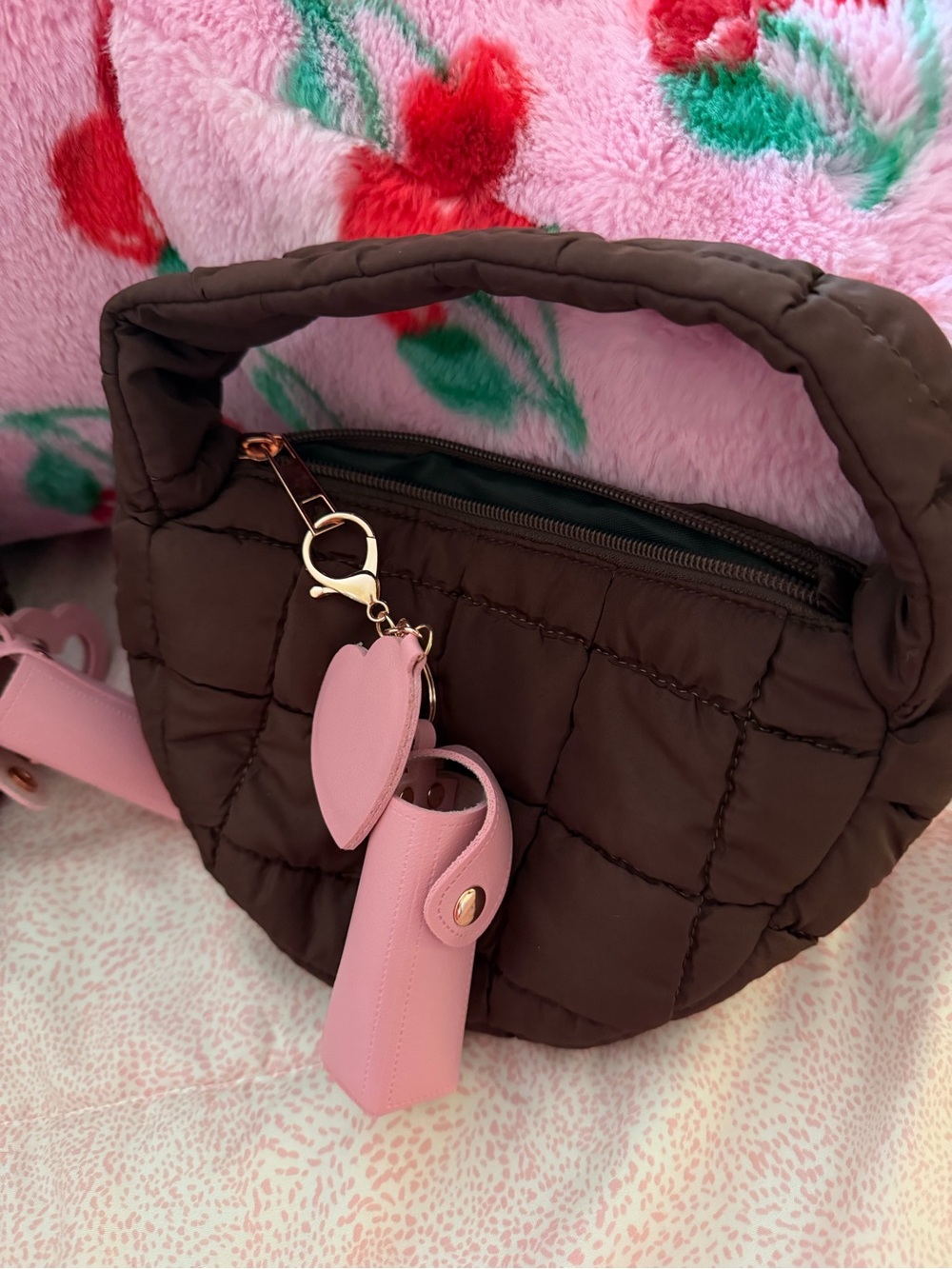 Quilted Brown Handbag with Pink Charm Accents. I have 2. I will sale both.